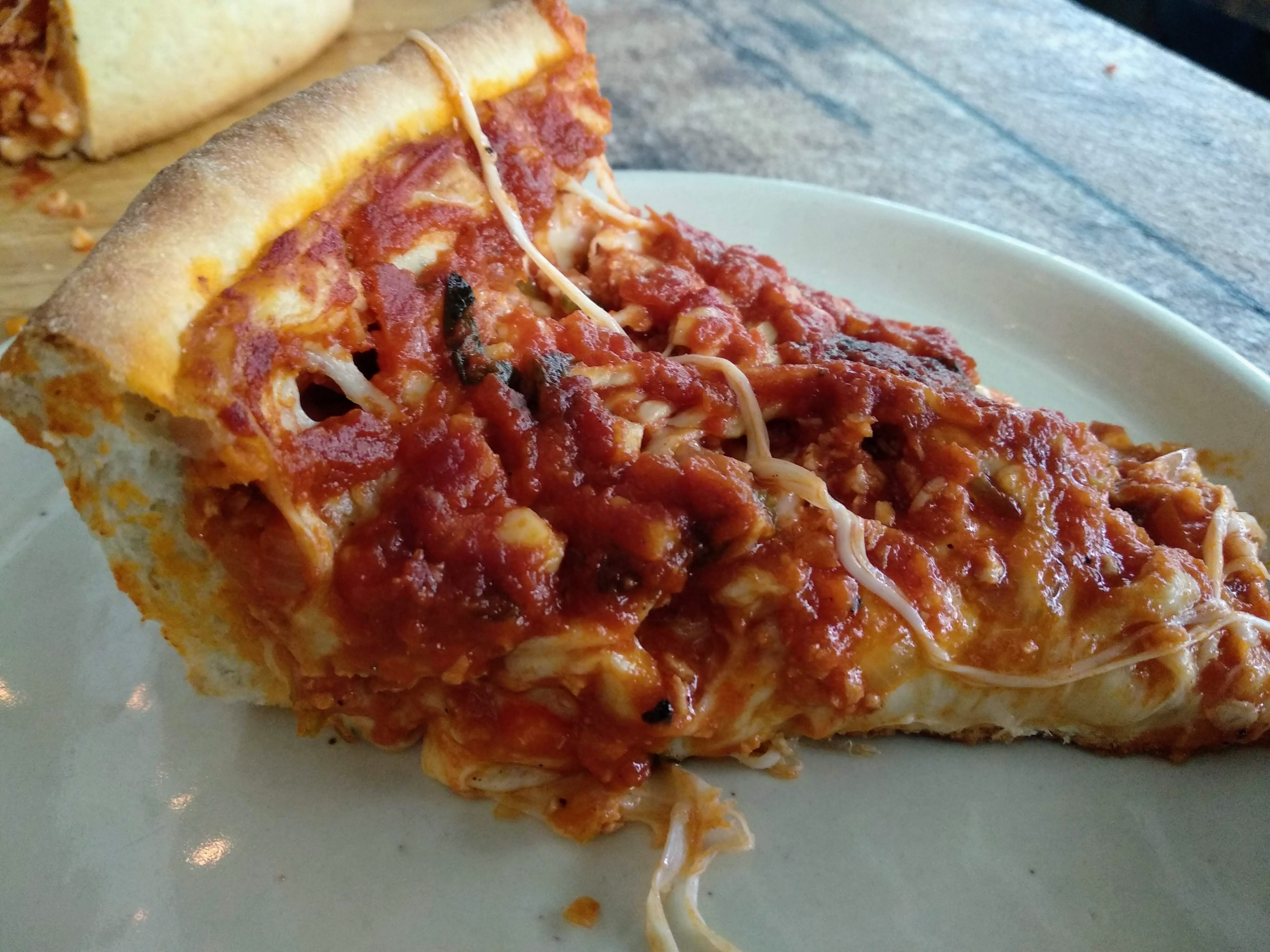 Meat Lovers Chicago Style Deep Dish Pizza Slice
