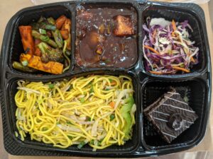 Paneer In Black Pepper Sauce With Hakka Noodle Mealbox - Todi Mill Social