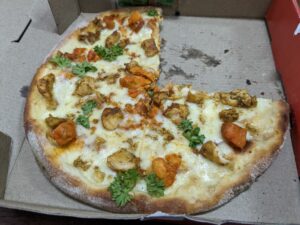 chicken kingdom pizza from olio the wood fired pizzeria